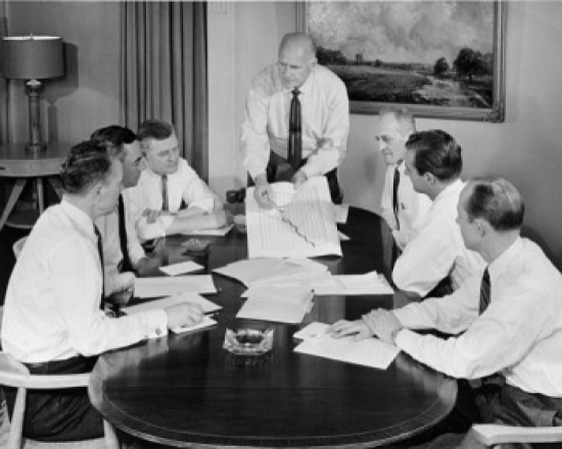 Business executives discussing chart in conference room Canvas Art - (24 x 36)