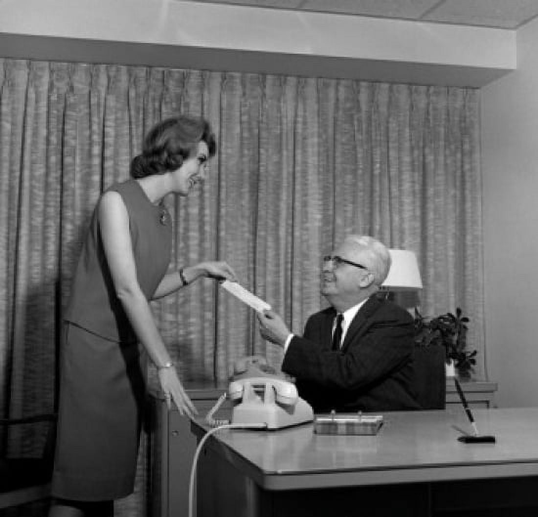 Business man and secretary working in office Canvas Art - (18 x 24)