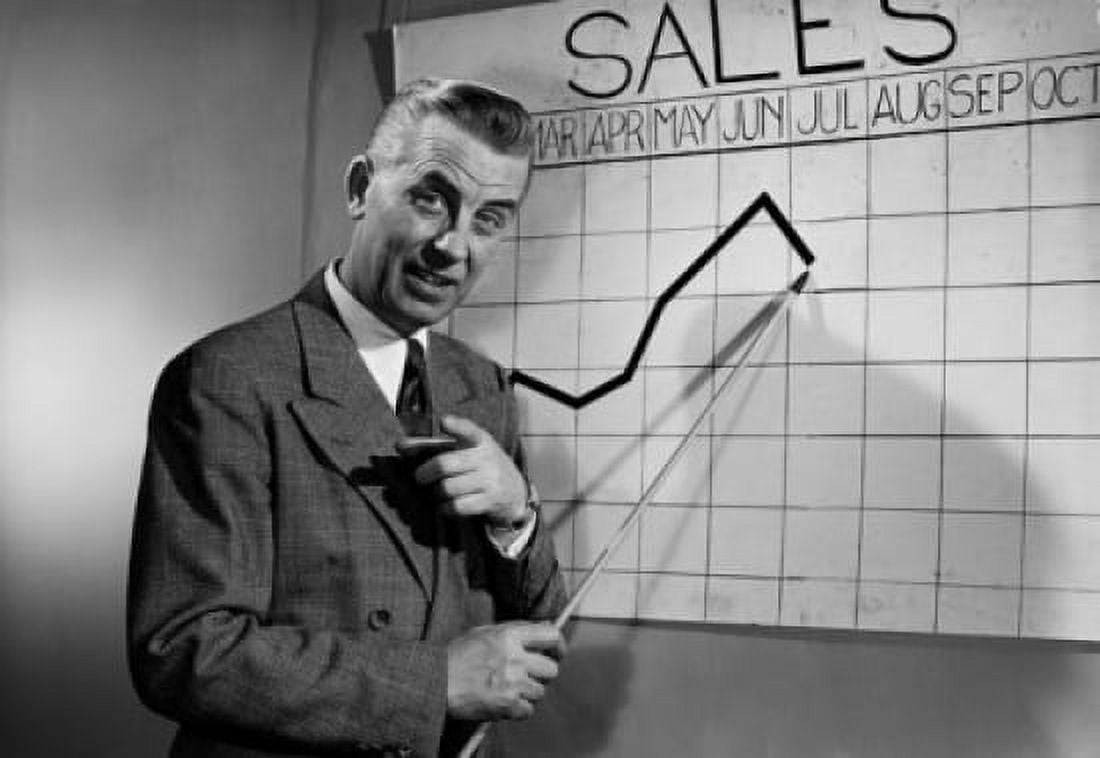Business man giving presentation in front of chart Canvas Art -  (18 x 24)