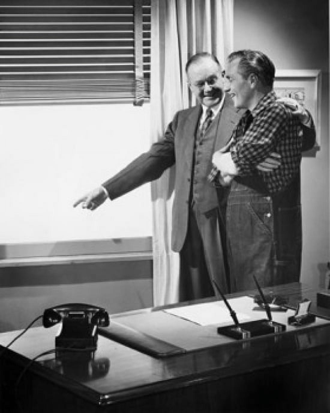 Businessman and farmer looking through window Canvas Art - (18 x 24)