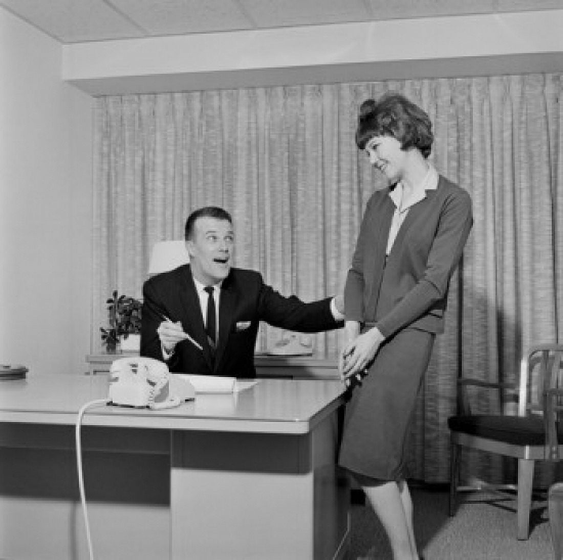 Businessman and secretary laughing in office Canvas Art - (24 x 36)