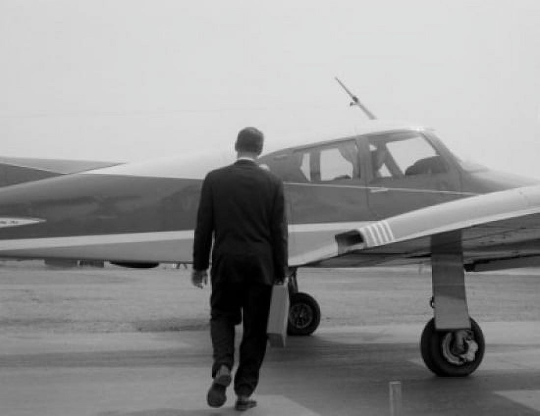 Businessman approaching private plane Canvas Art - (24 x 36)