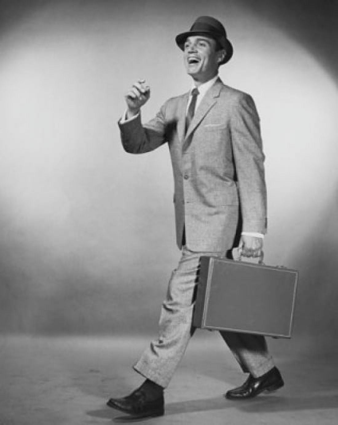 Businessman carrying briefcase Canvas Art - (18 x 24)