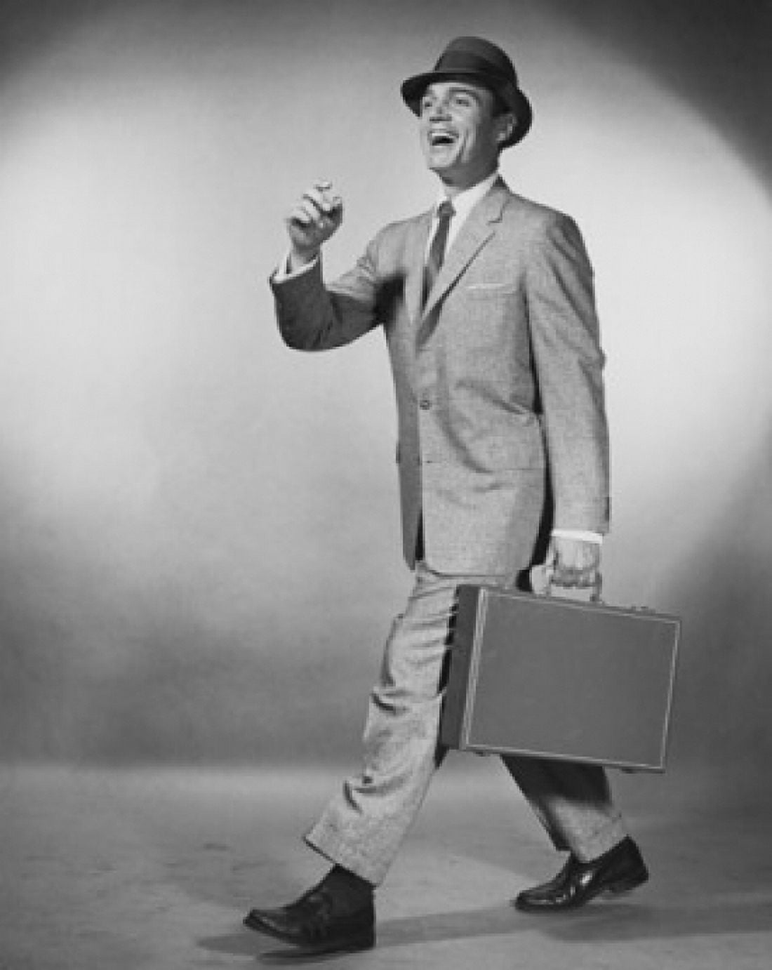 Businessman carrying briefcase Canvas Art - (24 x 36)