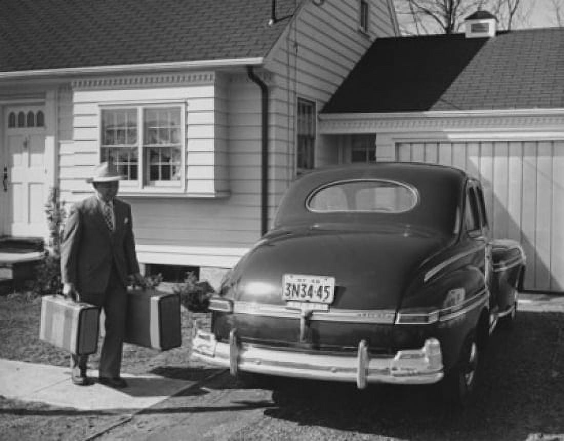 Businessman carrying suitcases and standing near a car Canvas Art - (24 x 36)