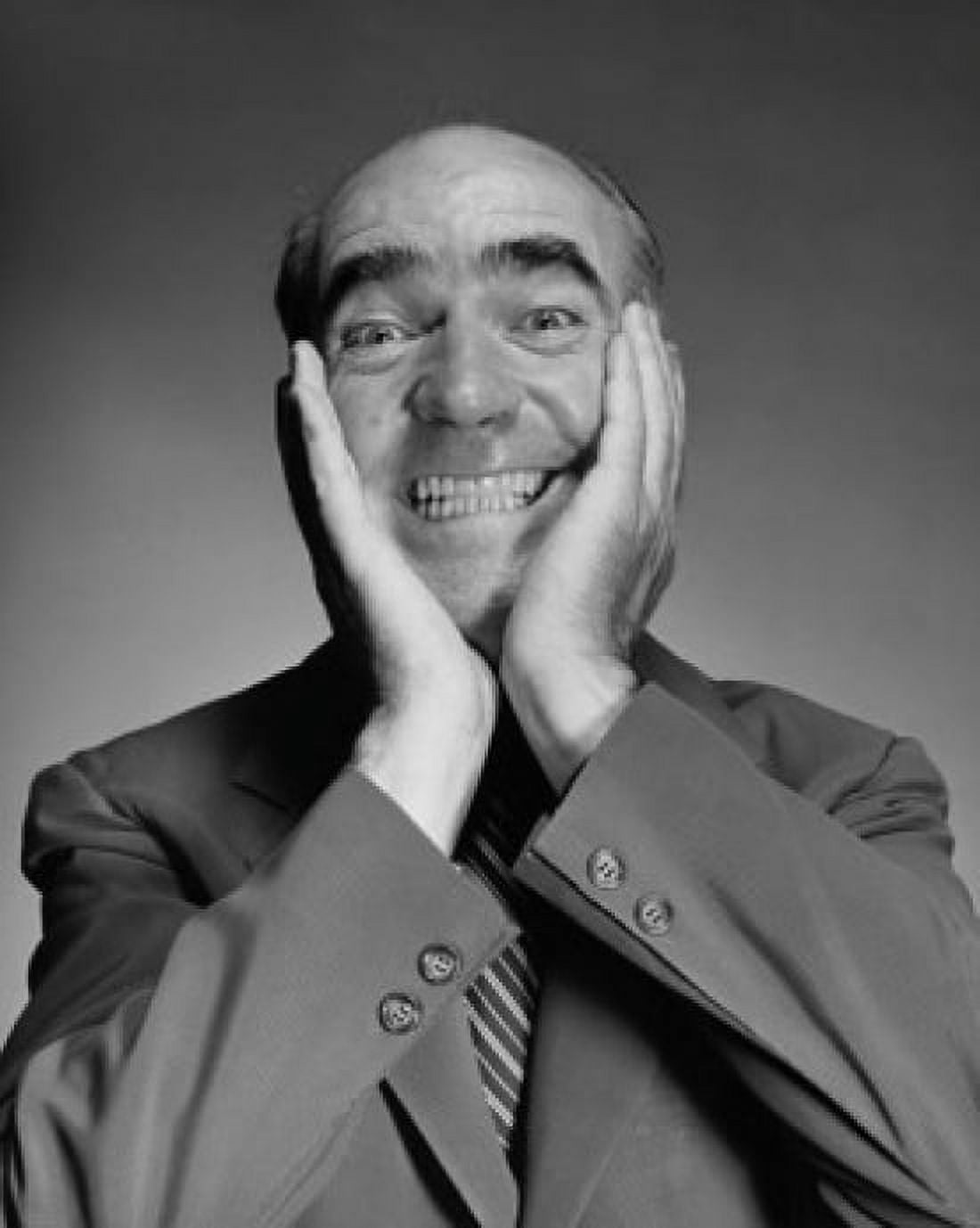 Businessman clenching his teeth with his hands on his face Canvas Art - (24 x 36)