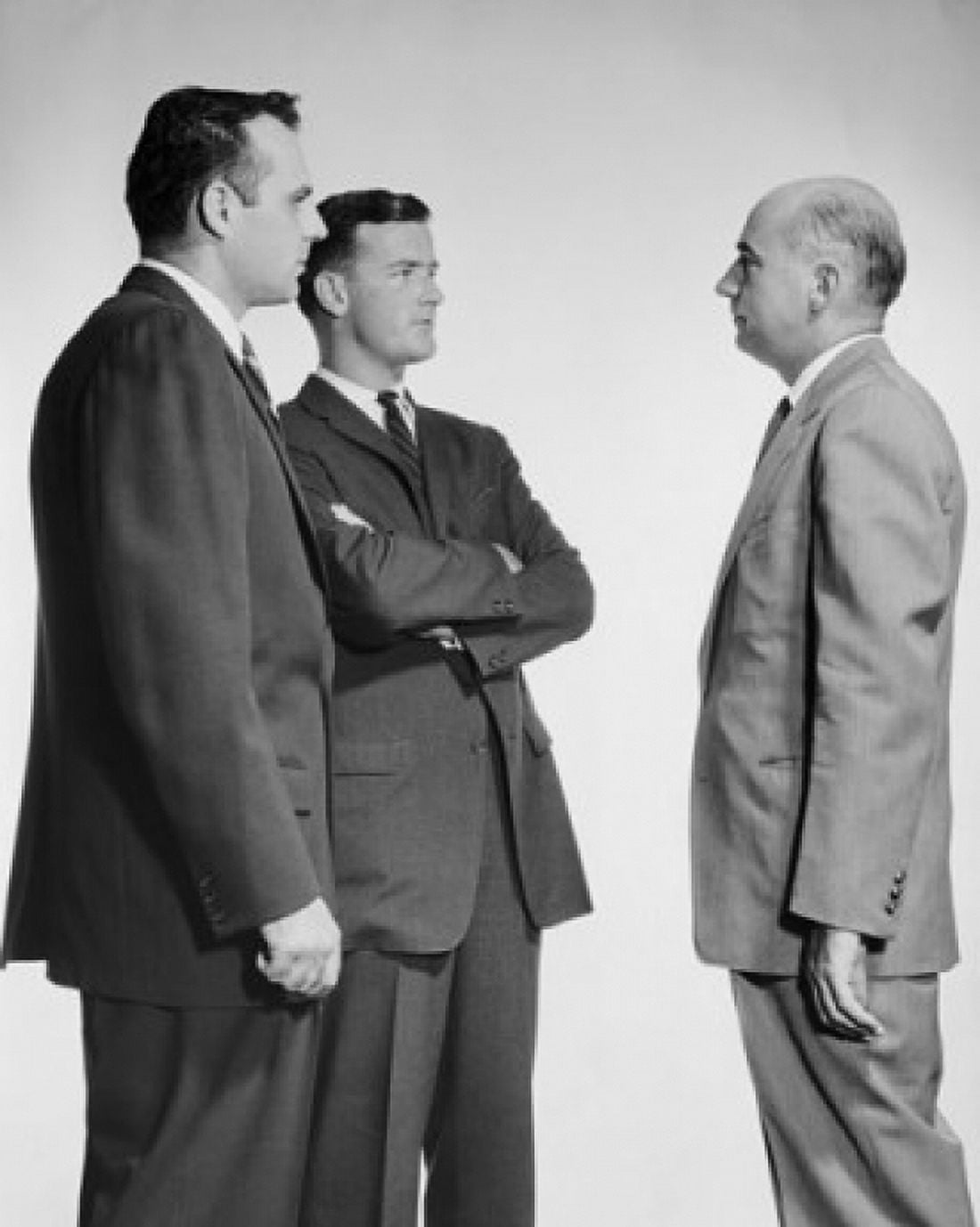 Businessman confronting two other businessmen Canvas Art - (24 x 36)