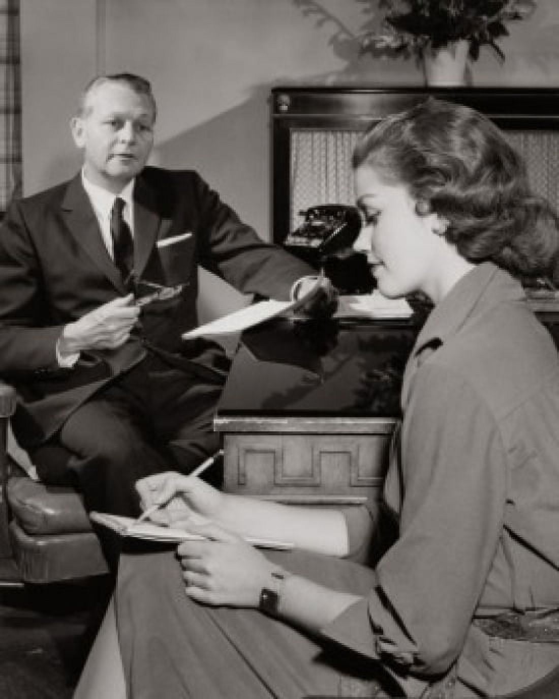 Businessman dictating a letter to his secretary in an office Canvas Art -  (24 x 36)