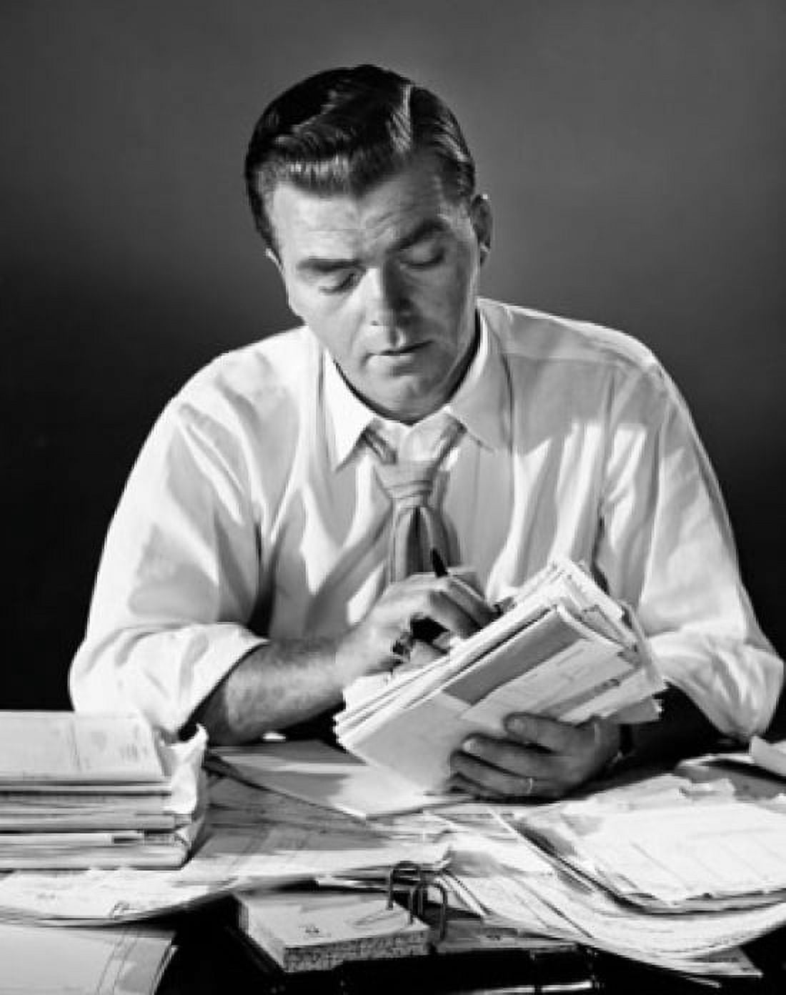 Businessman doing paperwork Canvas Art - (24 x 36)