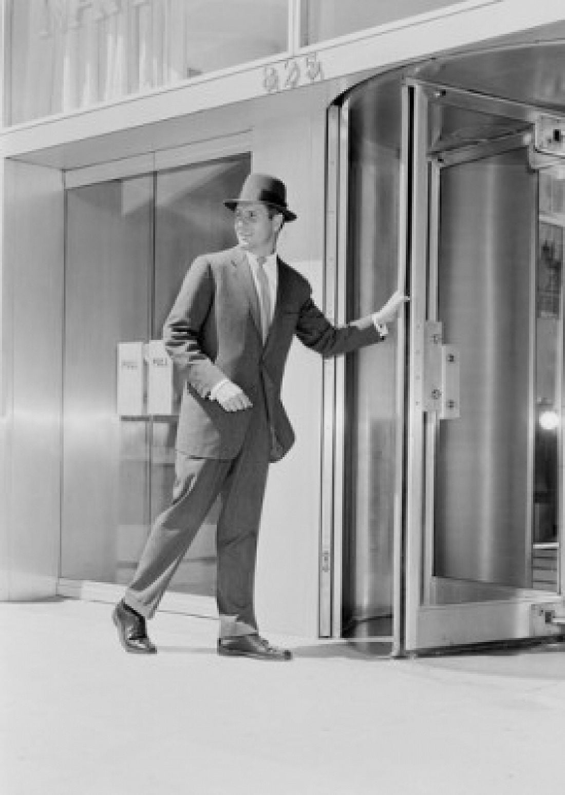 Businessman entering building Canvas Art - (18 x 24)