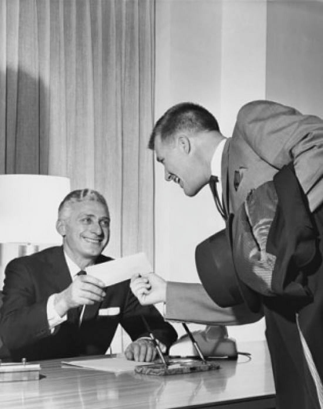Businessman giving a check to his colleague Canvas Art - (18 x 24)