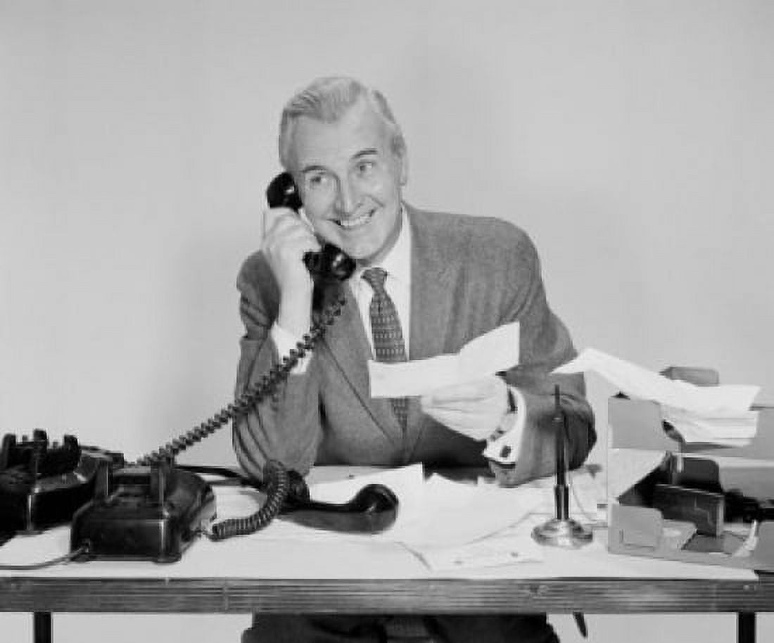Businessman holding a check and talking on the telephone Canvas Art - (24 x 36)
