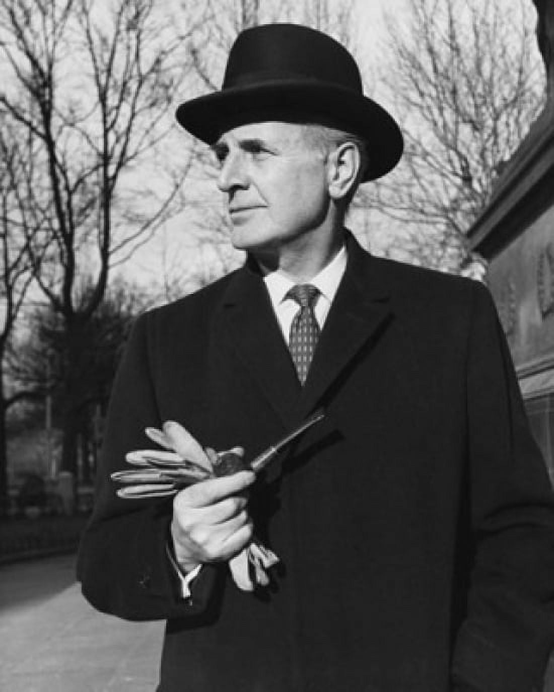Businessman holding a pipe Canvas Art - (24 x 36)