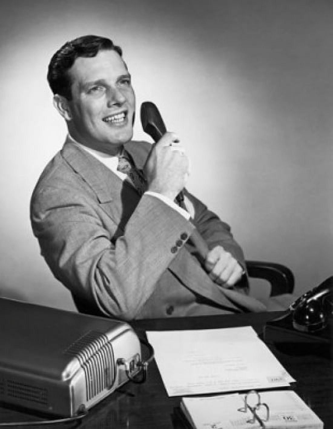 Businessman holding a telephone receiver and smiling Canvas Art - (24 x 36)