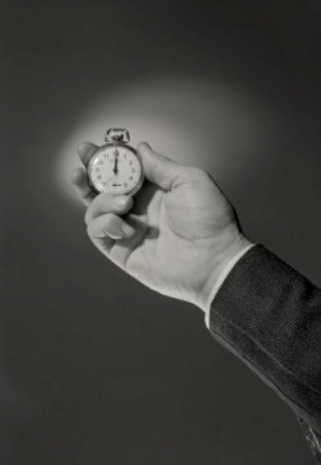 Businessman holding pocket watch Canvas Art - (18 x 24)