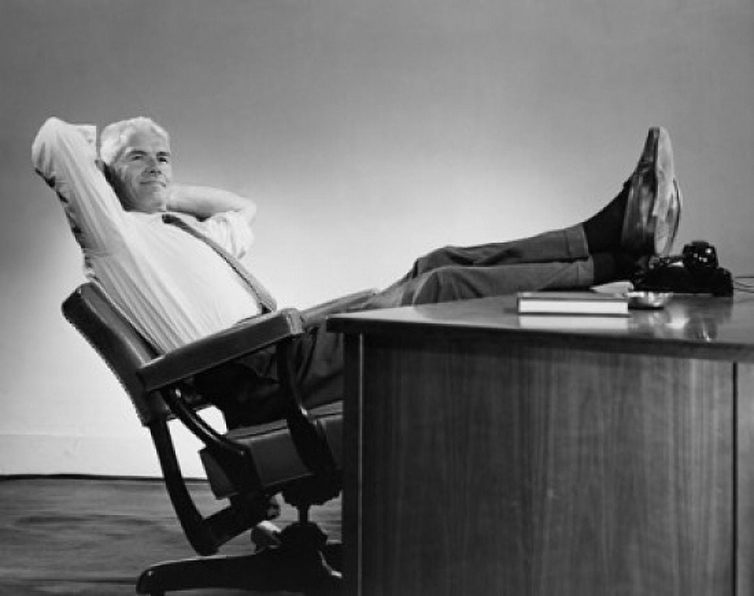 Businessman leaning in a chair with his feet resting on the desk Canvas Art - (18 x 24)