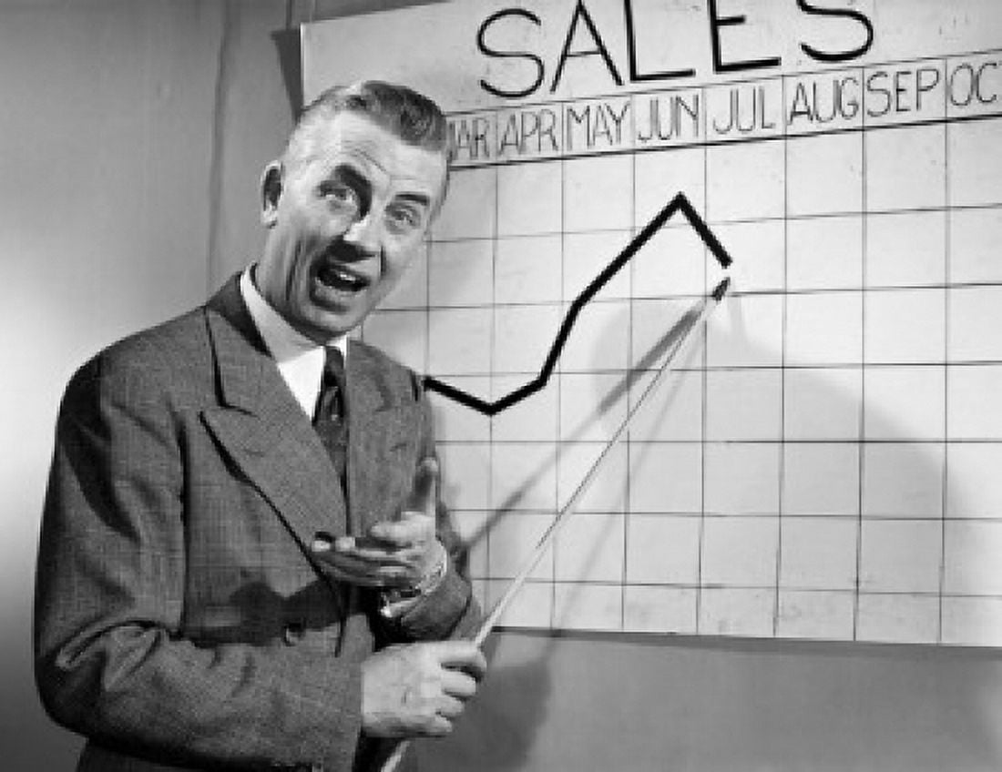 Businessman pointing at sales chart Canvas Art - (18 x 24)
