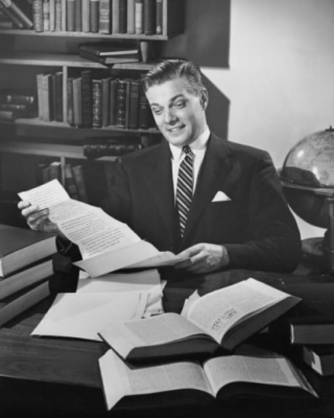 Businessman reading a document in an office and smiling Canvas Art - (24 x 36)
