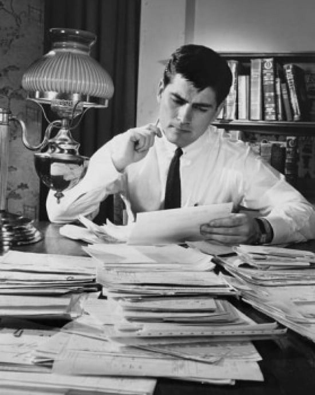 Businessman reading documents in an office Canvas Art - (18 x 24)