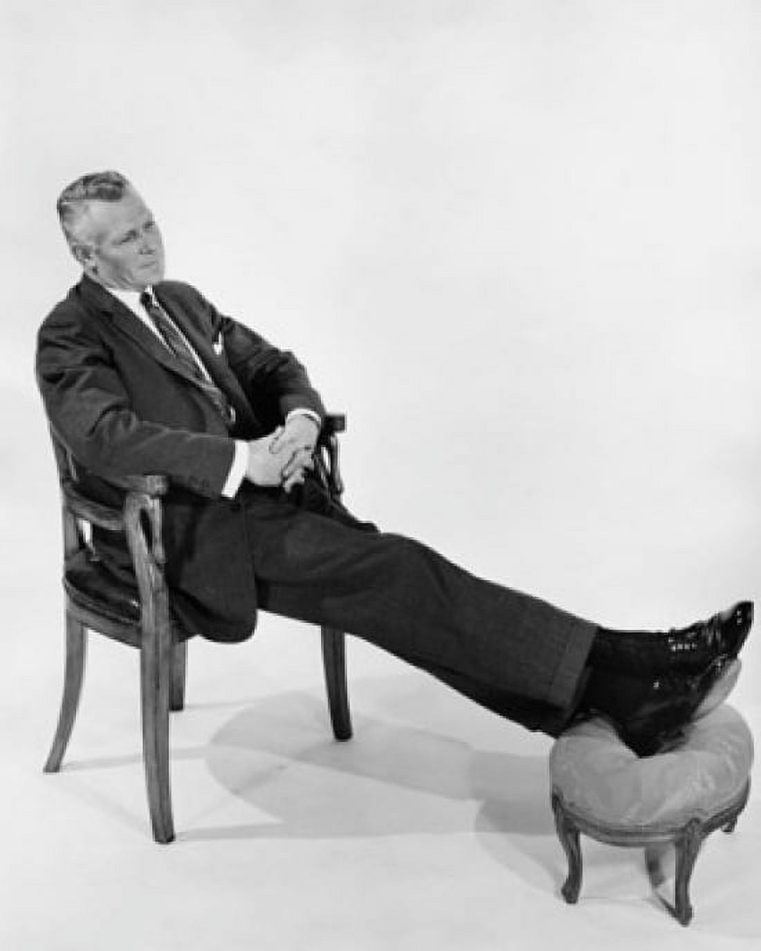 Businessman relaxing in chair Canvas Art - (18 x 24)