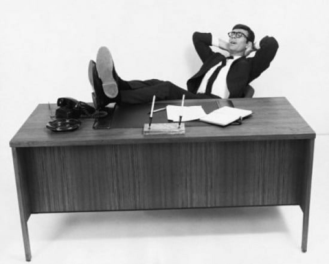 Businessman resting in an office with his feet up Canvas Art - (18 x 24)