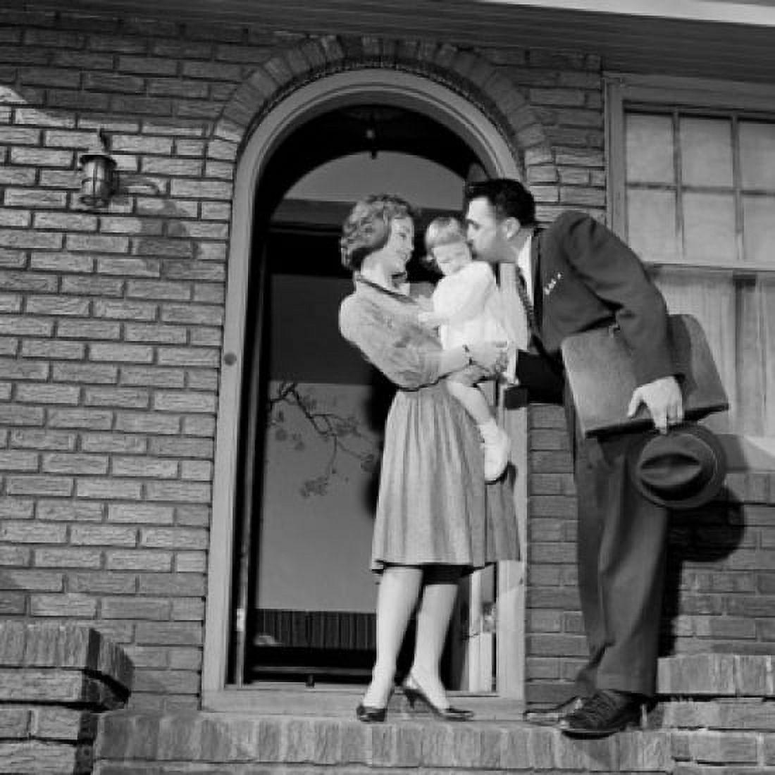 Businessman saying goodbye to wife and young daughter as he goes out to work Canvas Art - (24 x 36)