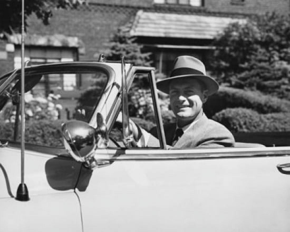 Businessman sitting in a car and smiling Canvas Art - (24 x 36)