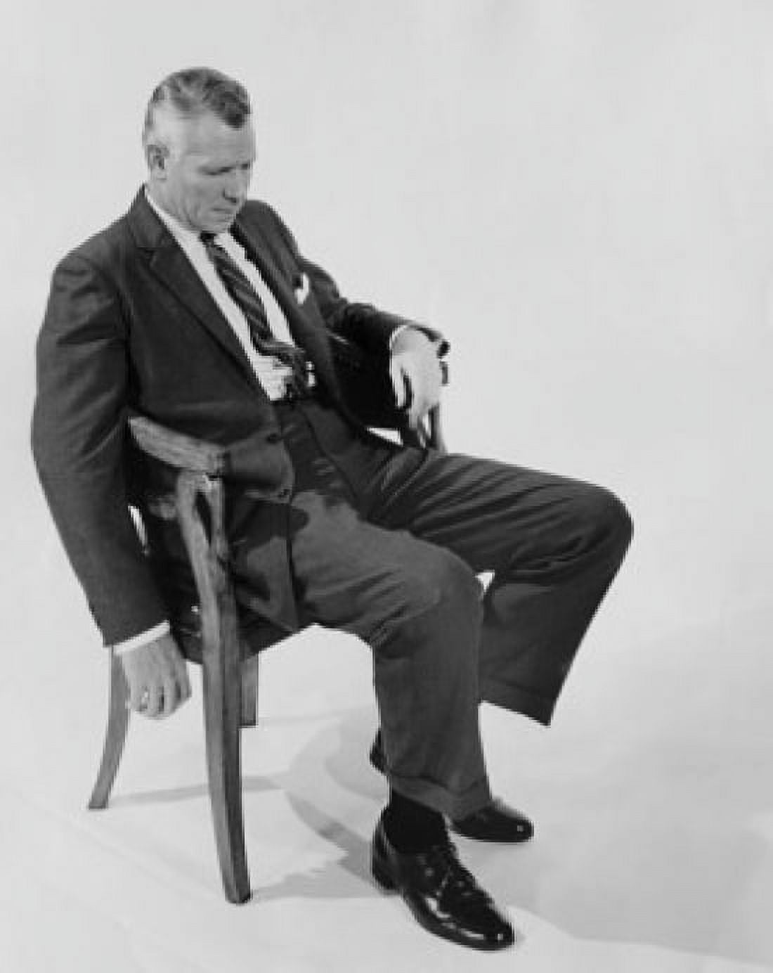 Businessman sitting on a chair Canvas Art - (18 x 24)