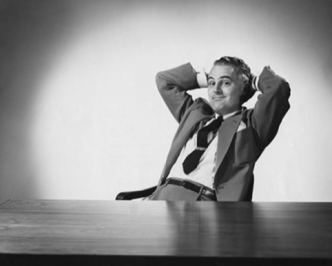 Businessman sitting with his head resting in his hands Canvas Art - (24 x 36)