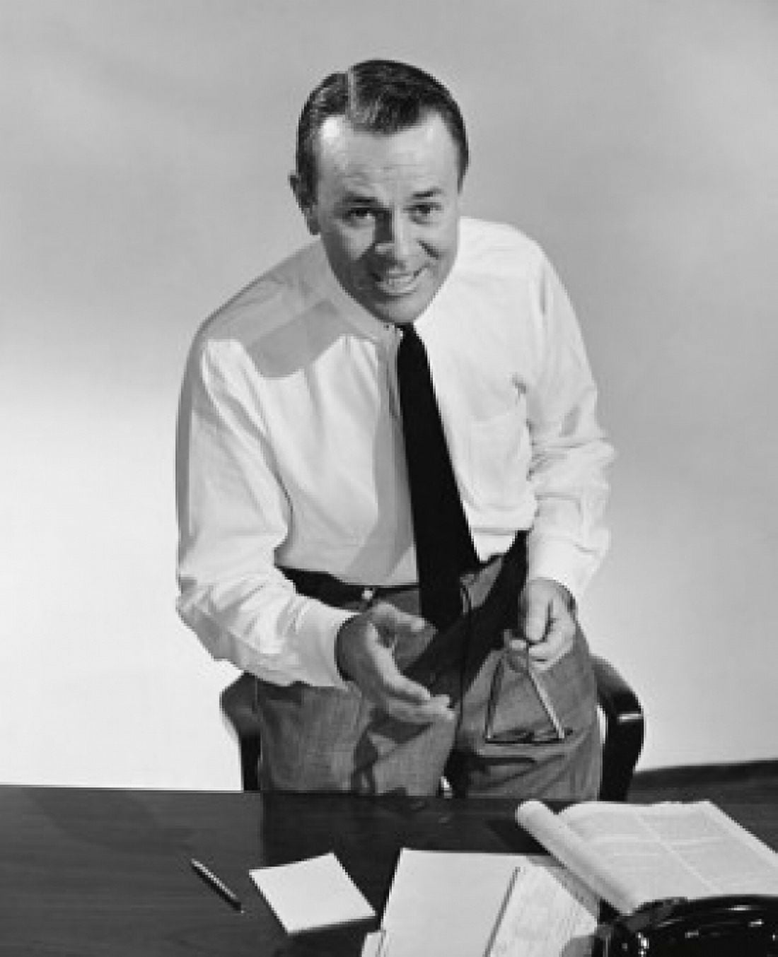 Businessman standing at a desk in an office and smiling Canvas Art - (18 x 24)