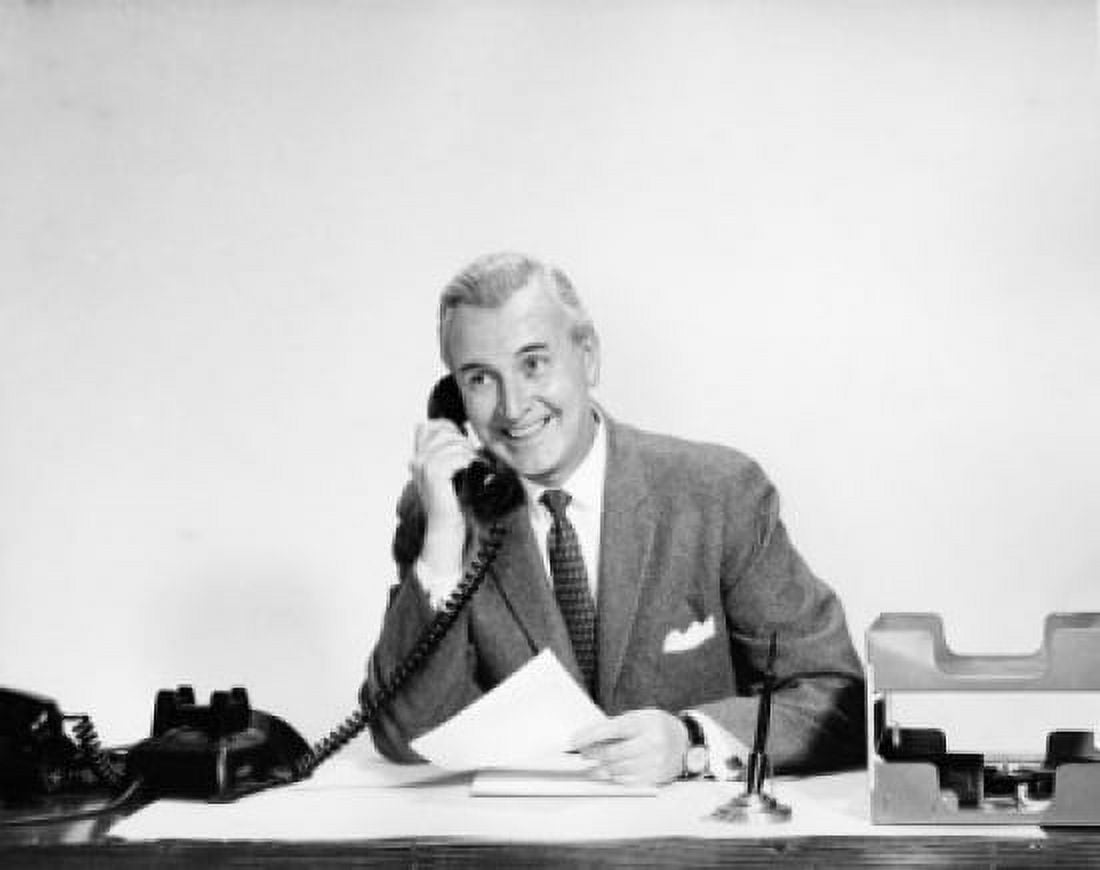 Businessman talking on the telephone in an office Canvas Art - (18 x 24)
