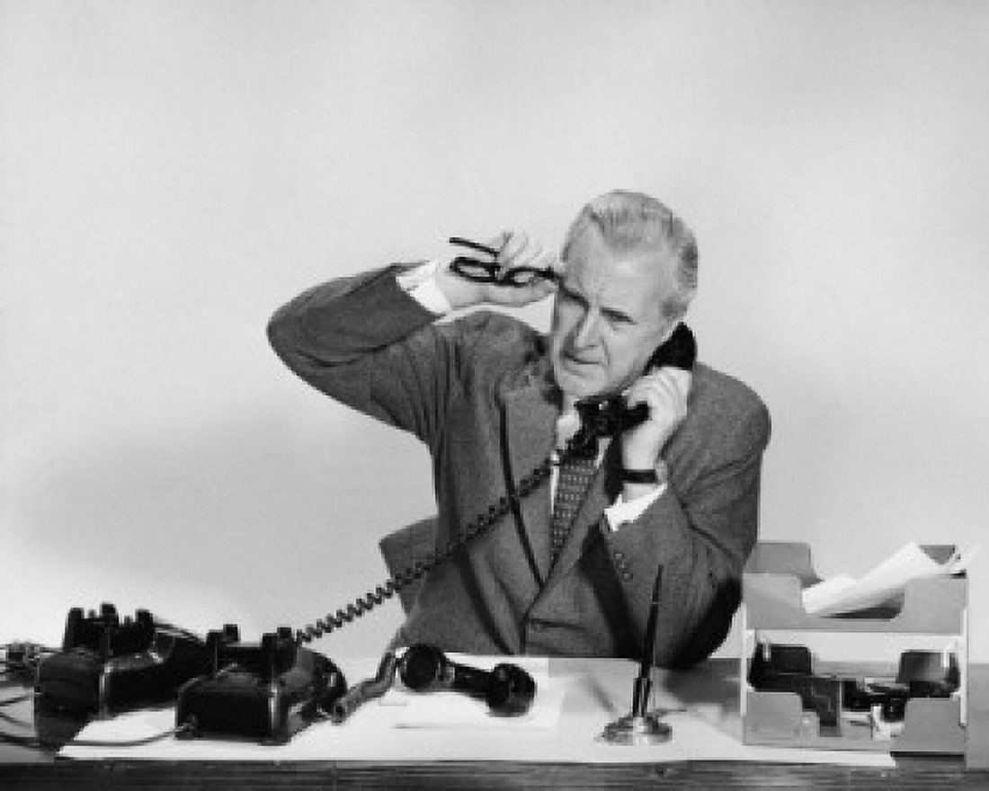 Businessman talking on the telephone in an office Canvas Art - (18 x 24)