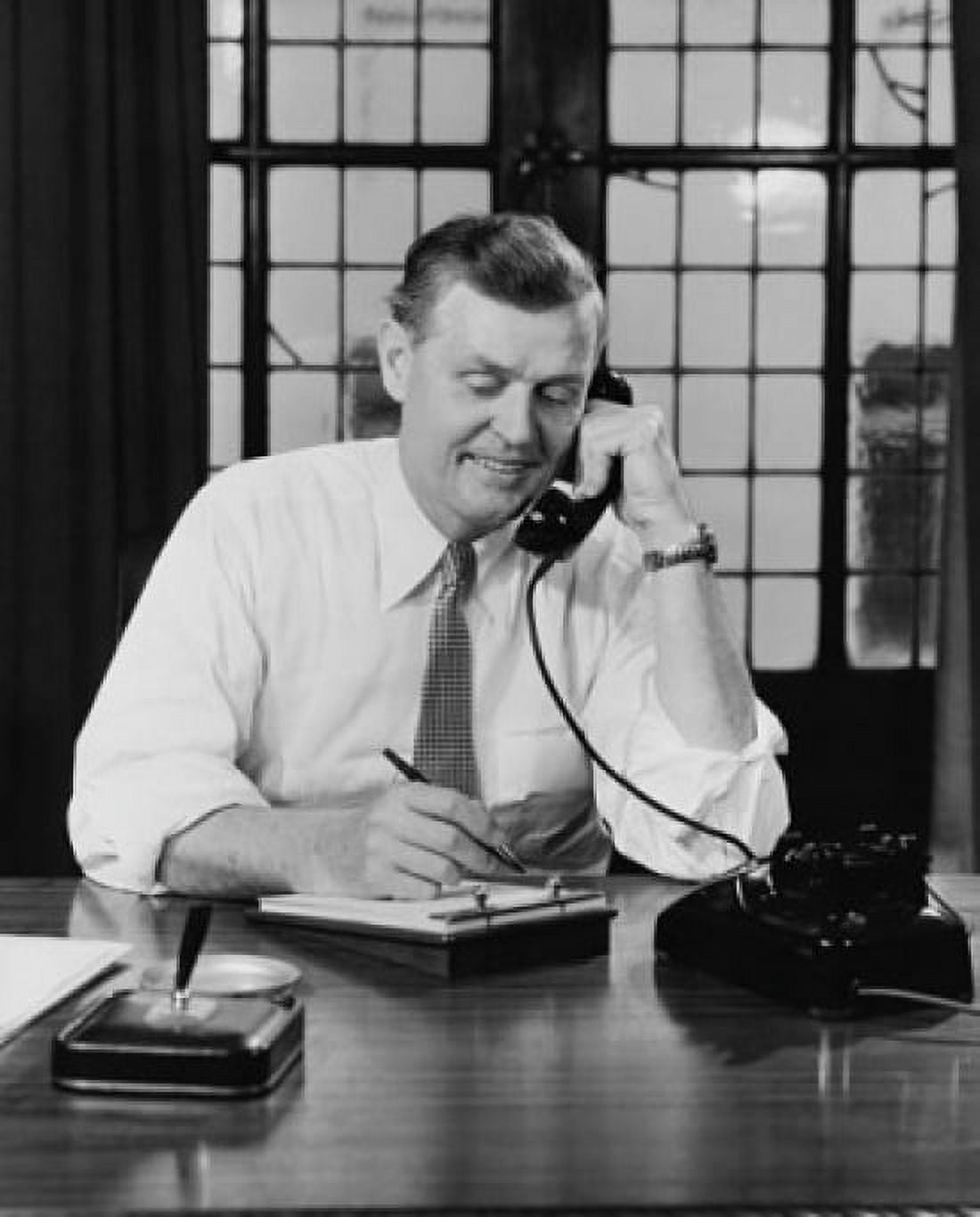 Businessman talking on the telephone in an office Canvas Art - (18 x 24)