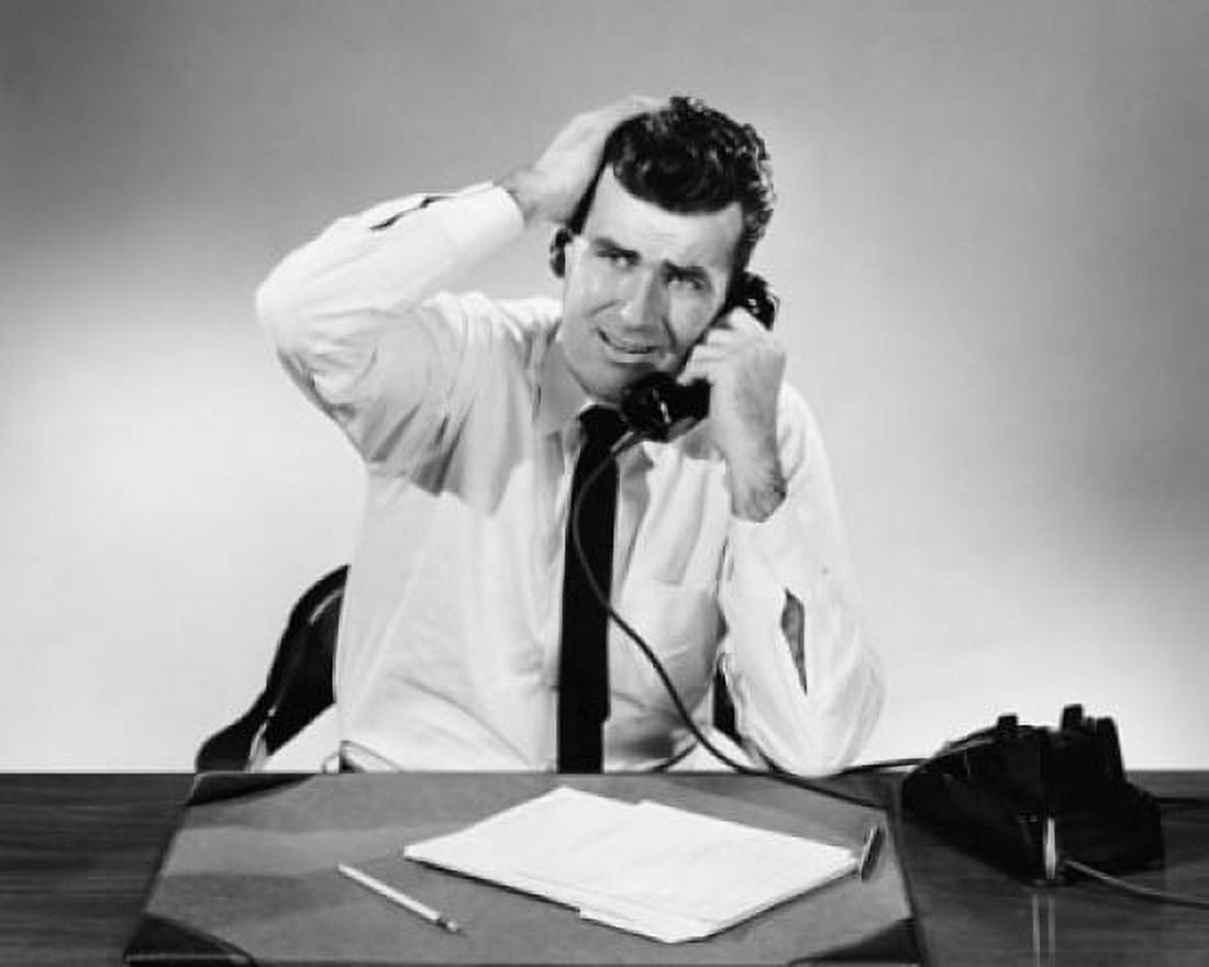 Businessman talking on the telephone in an office Canvas Art - (18 x 24)