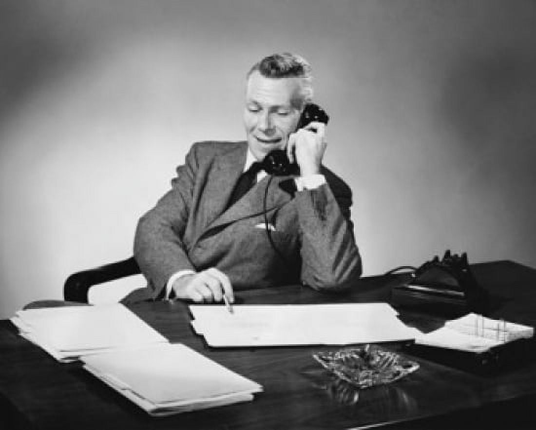 Businessman talking on the telephone in an office Canvas Art - (18 x 24)