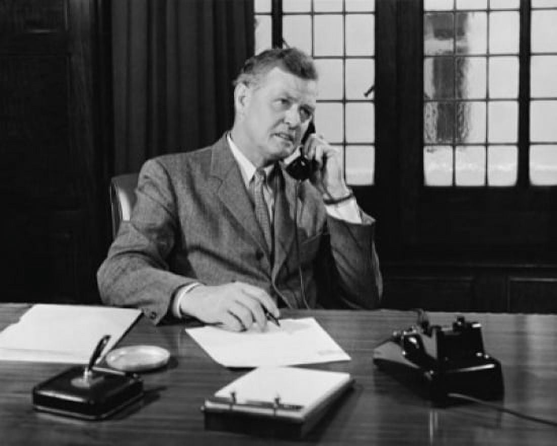 Businessman talking on the telephone in an office Canvas Art - (24 x 36)