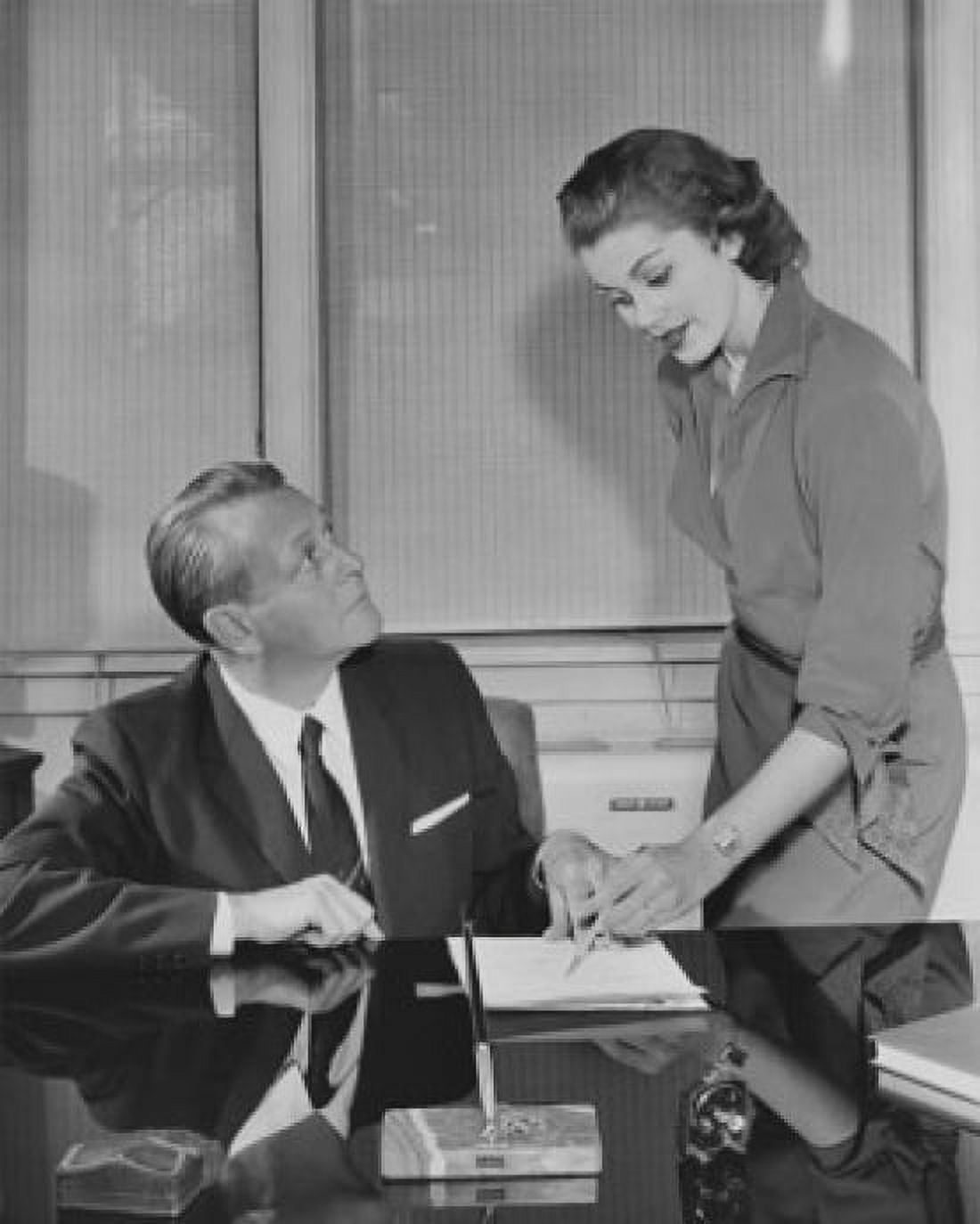 Businessman talking with his secretary in an office Canvas Art - (24 x 36)