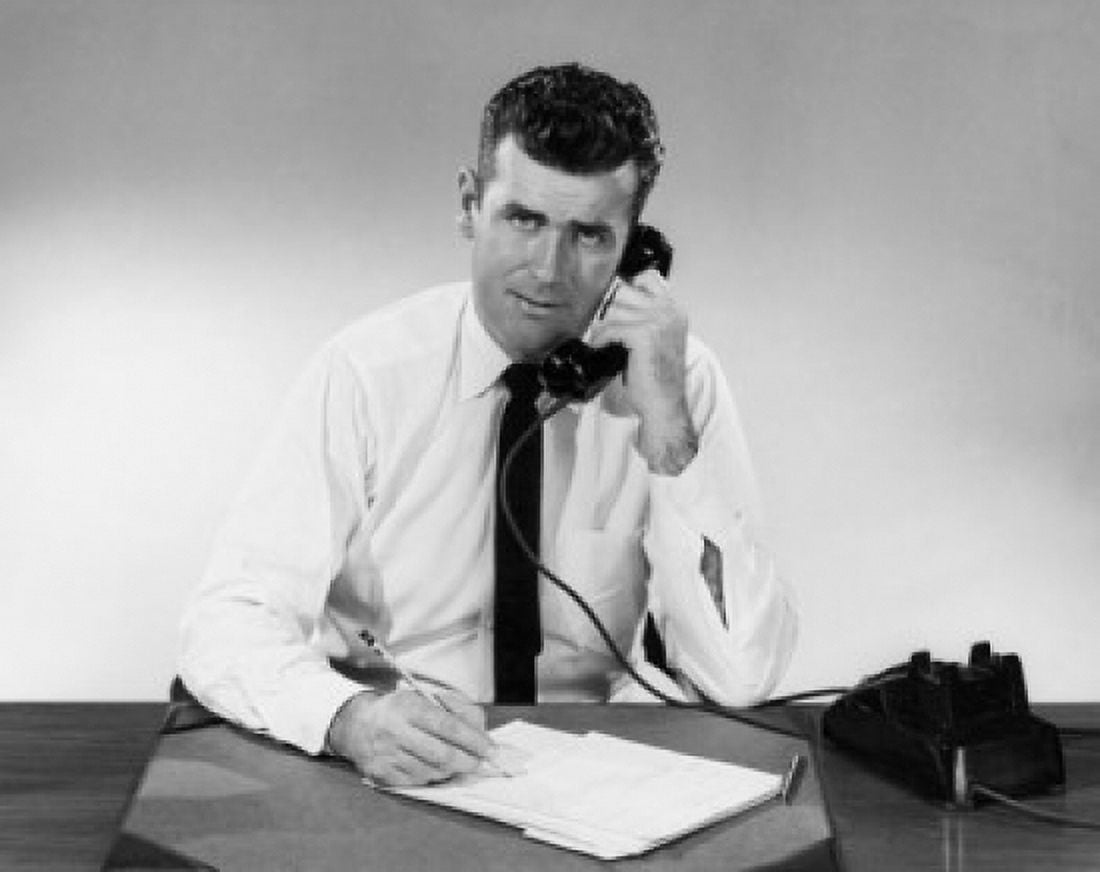 Businessman using telephone in office Canvas Art - (24 x 36)