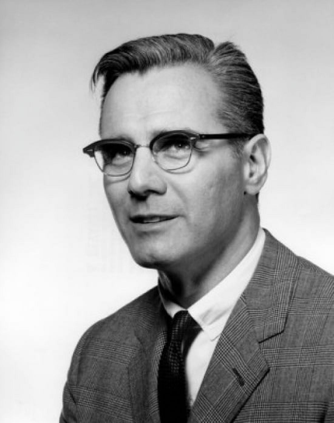 Businessman wearing glasses looking away Canvas Art - (24 x 36)