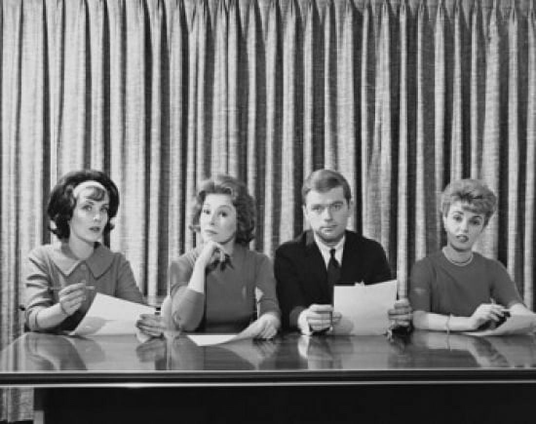 Businessman with three businesswomen sitting at a table Canvas Art - (24 x 36)