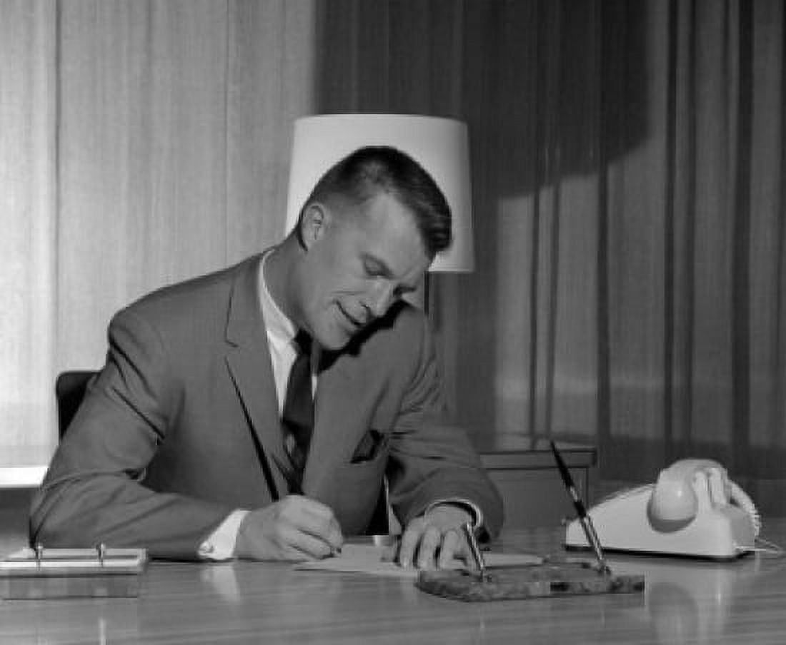 Businessman writing at desk Canvas Art - (24 x 36)