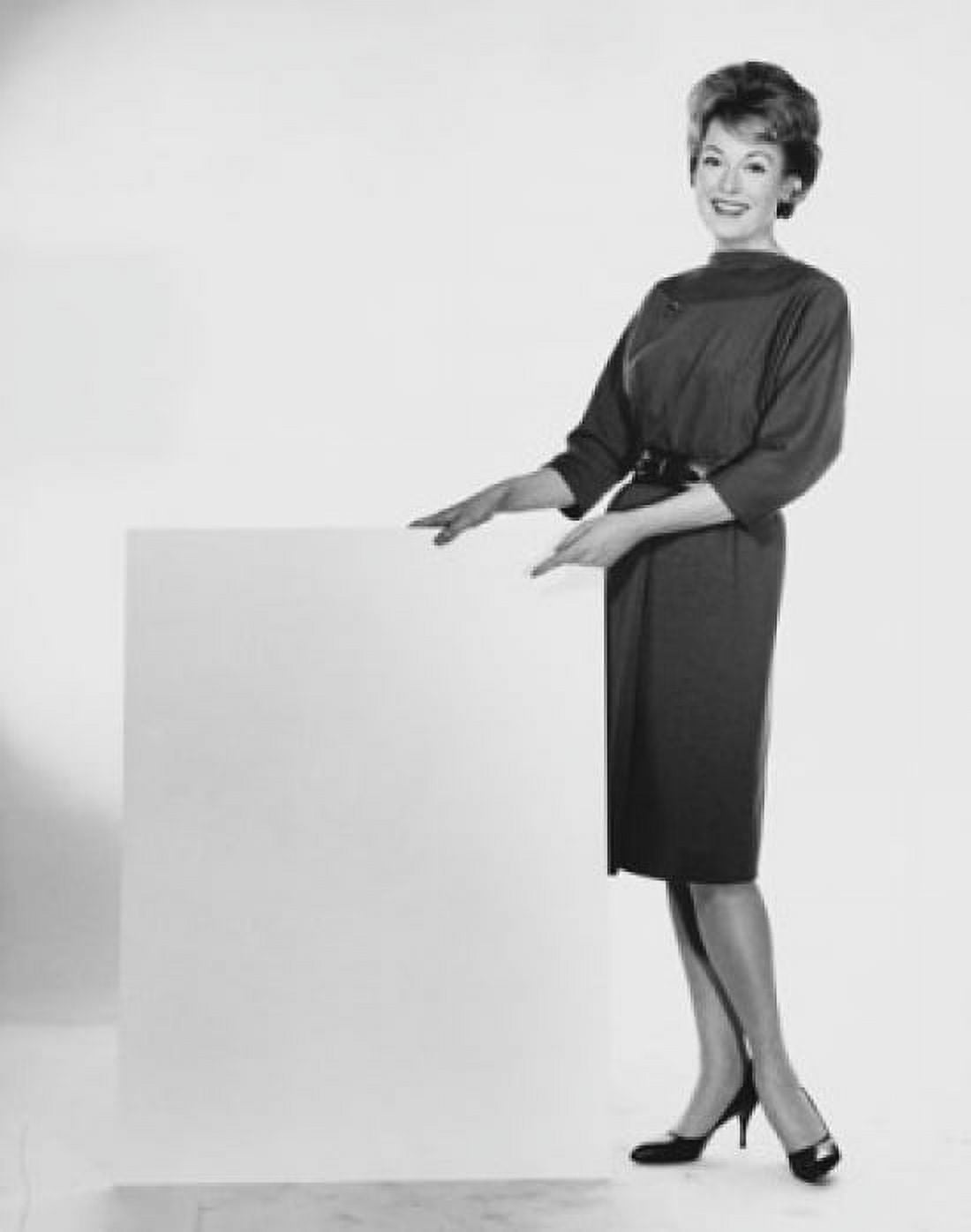 Businesswoman holding a blank placard Canvas Art - (18 x 24)