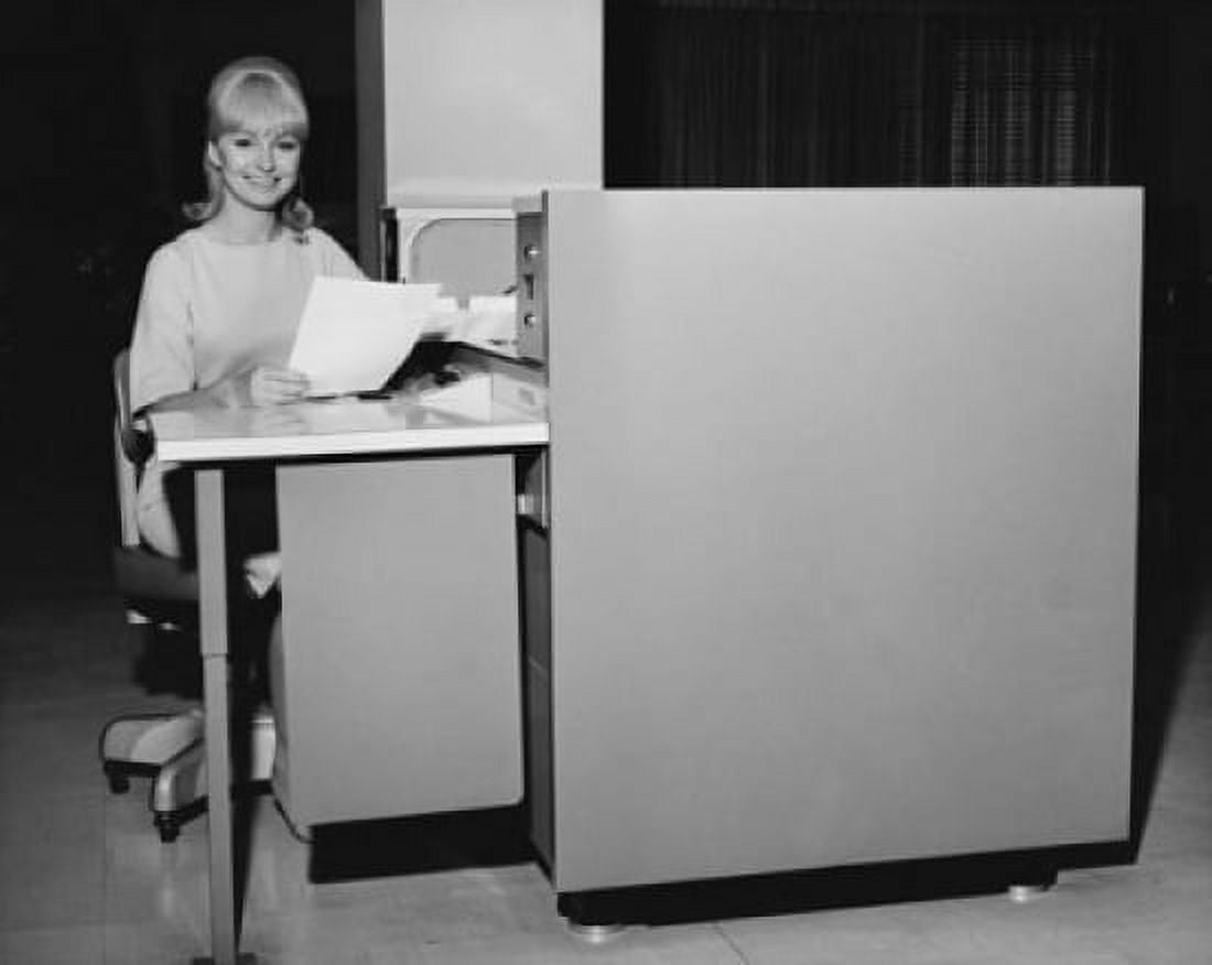 Businesswoman holding a document and smiling in an office Canvas Art - (18 x 24)
