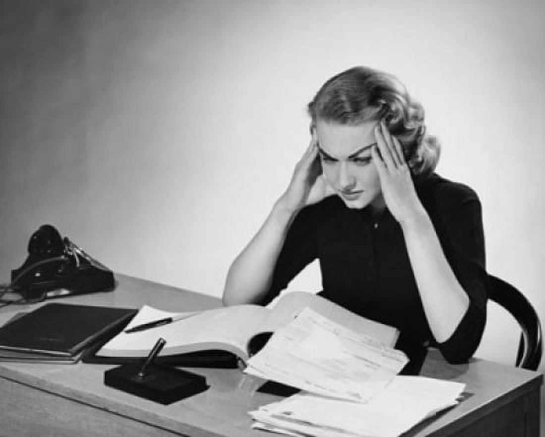 Businesswoman looking frustrated in an office Canvas Art - (18 x 24)