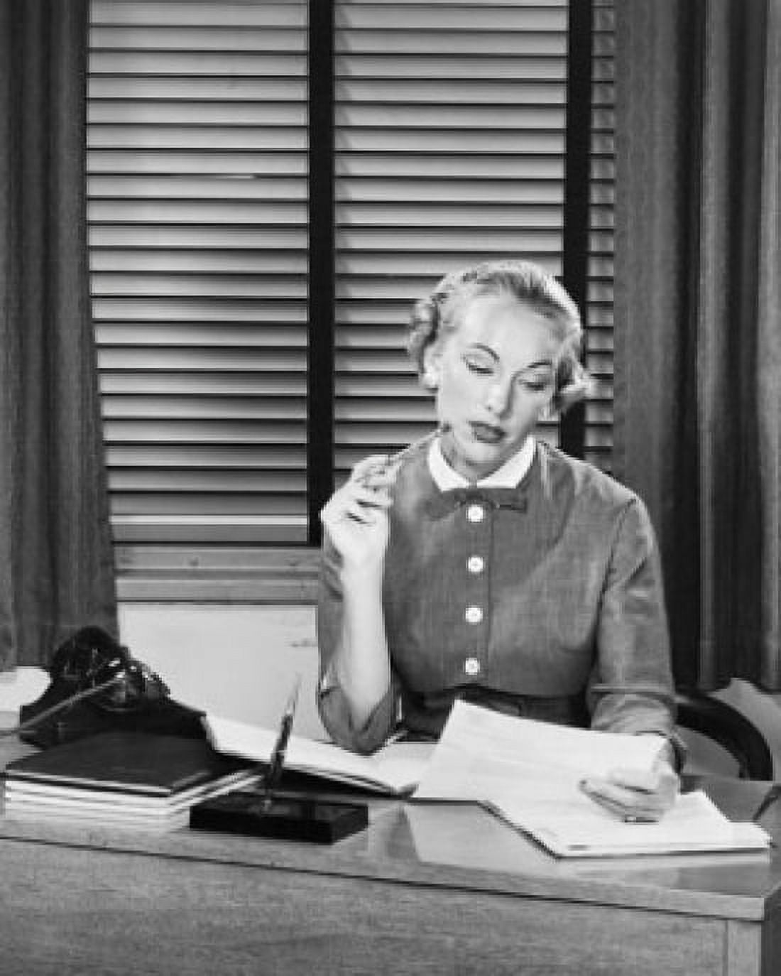 Businesswoman reading document Canvas Art - (24 x 36)