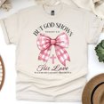 thumbnail image 1 of But God Shows His Love T-Shirt, Romans 5:8 Bible Verse Tee with Pink Bow, Natural, Size 5XL, 1 of 6