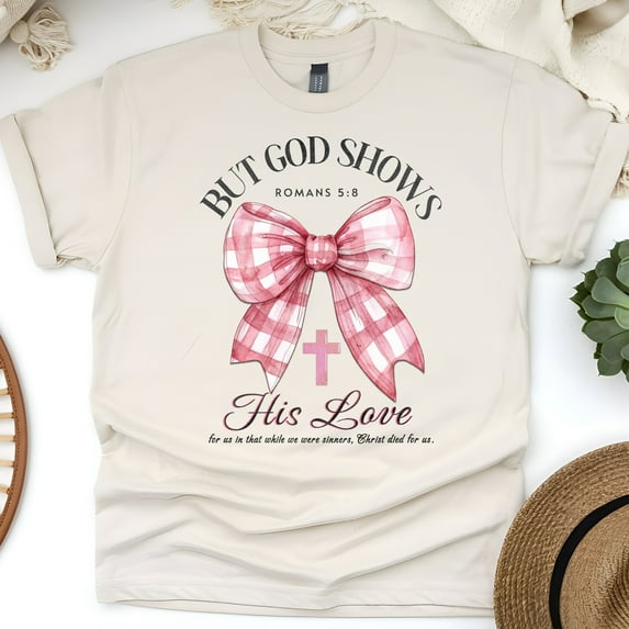 But God Shows His Love T-Shirt, Romans 5:8 Bible Verse Tee with Pink Bow, Natural, Size 5XL