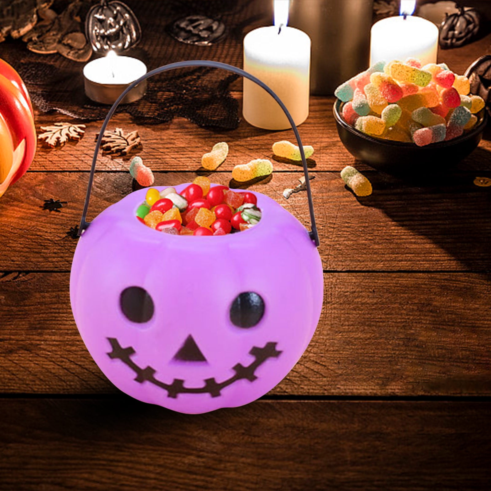 Scary ghost with halloween candy bucket and glowing Jack o lantern