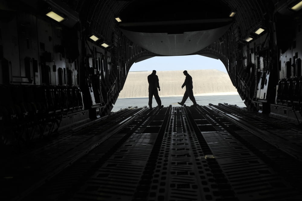 C-17A Globemaster III loadmasters go through prefight checks on the ramp Canvas Art - Stocktrek Images (34 x 23)
