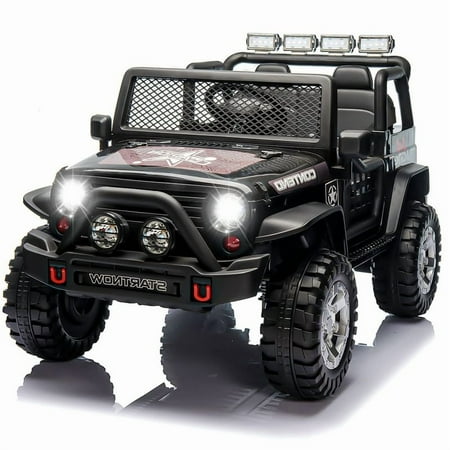 CAIDI 12 V Kids Ride On Truck, 2-Seater Battery Powered Toy Car w/ Remote Control, Spring Suspension, Bluetooth, LED Lights(Black)